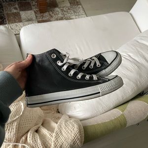 Leather Converse hightop sneakers
